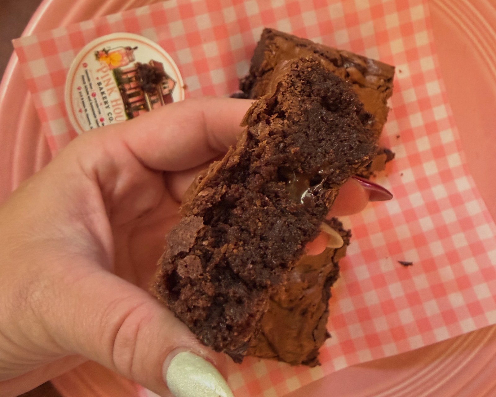Brownie squares on a pink plate